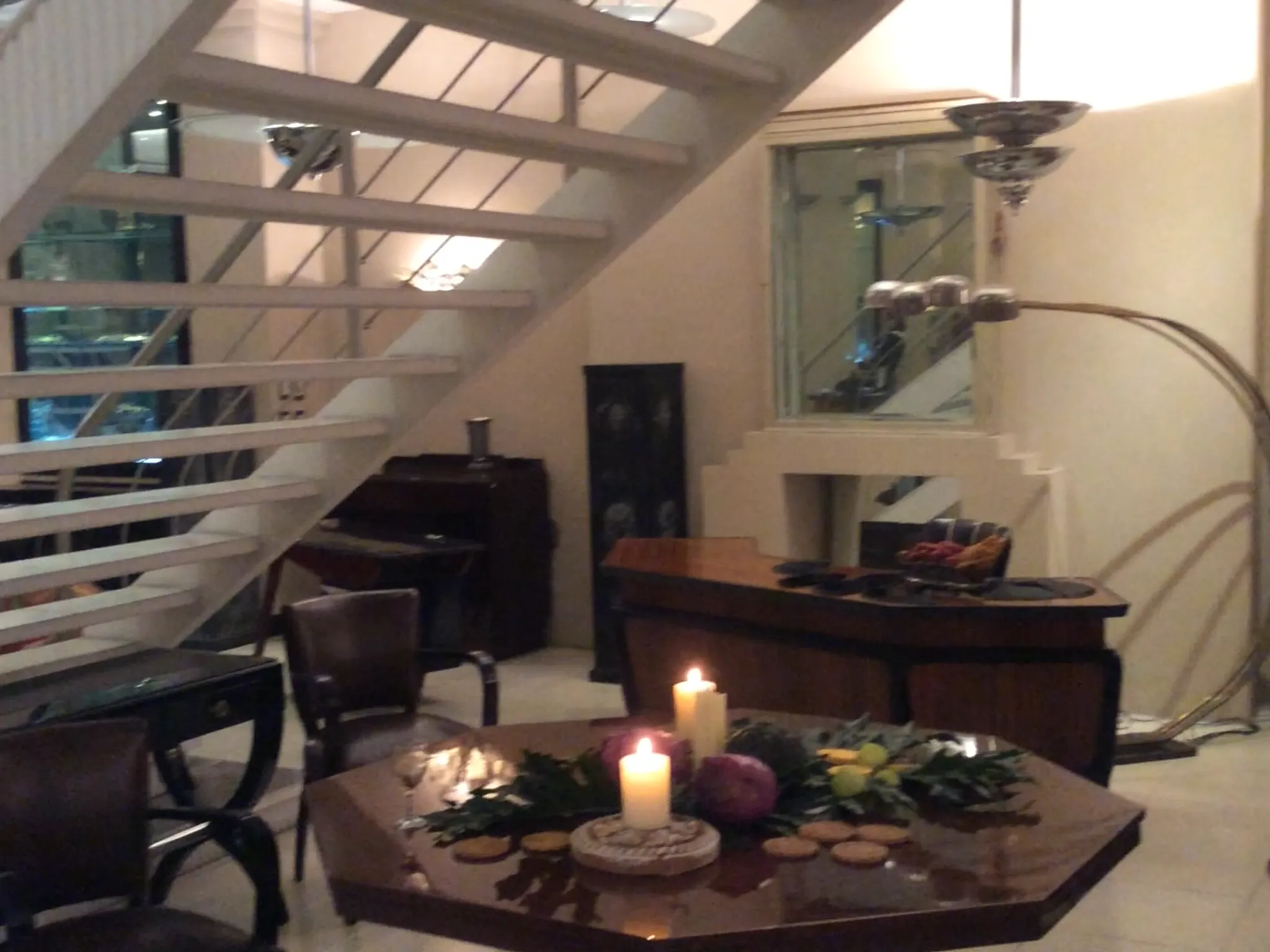 Antique dining table for 8 with elegant decor in a cozy setting.