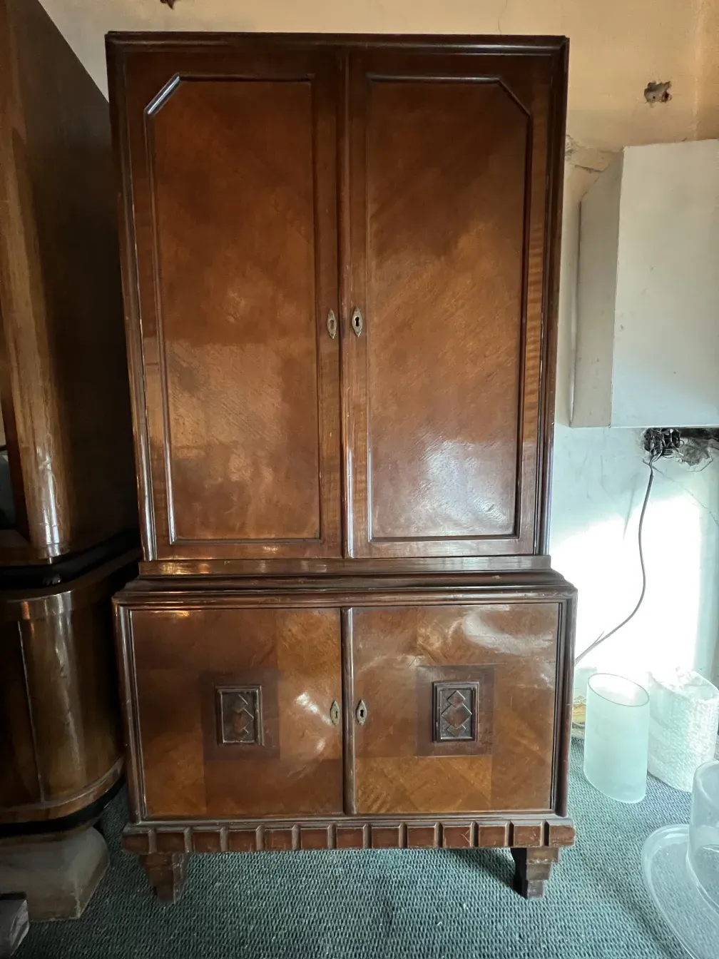 antique bookcase with decorative details, harmony in the setting