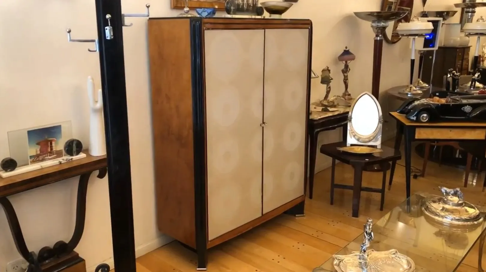 antique bookcase with elegant shelves and decor