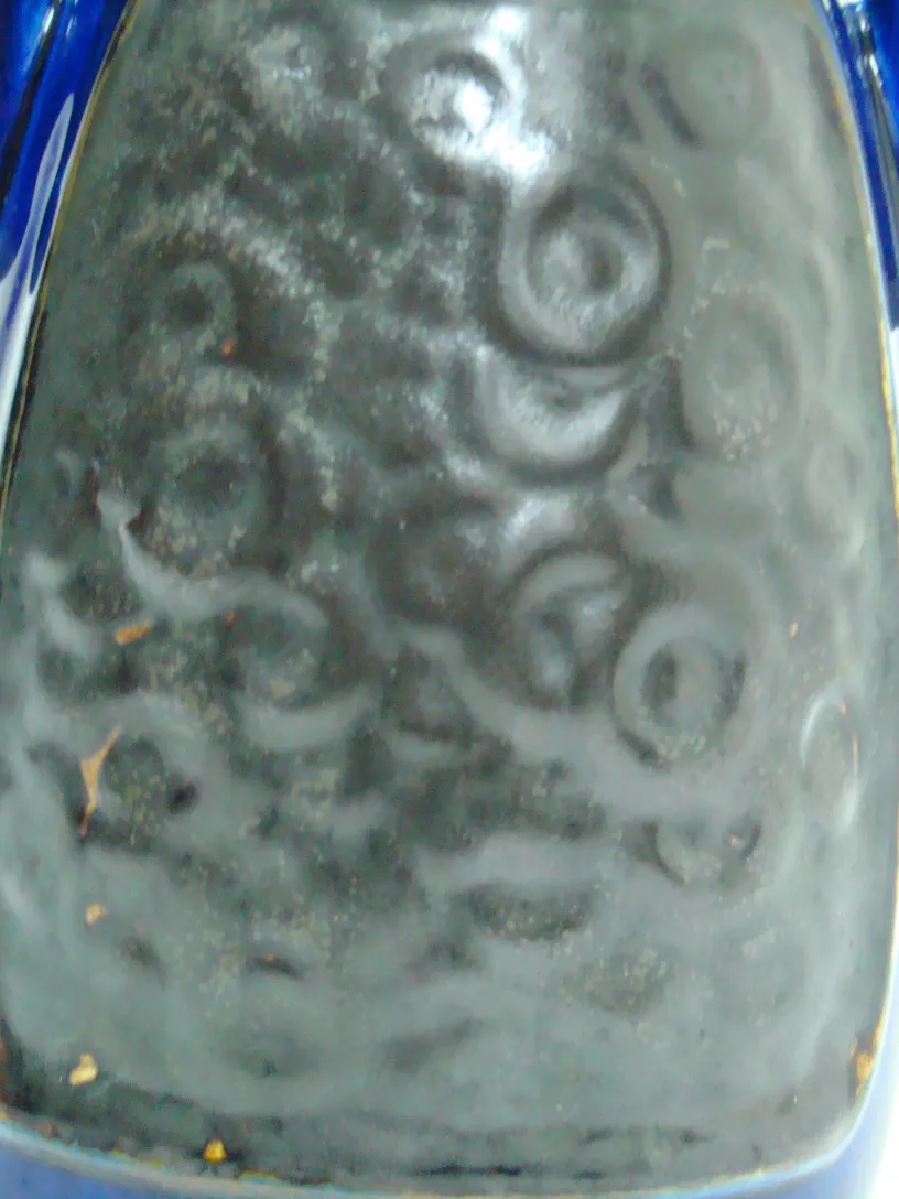 Detailed structure of antique ceramic with black patterns
