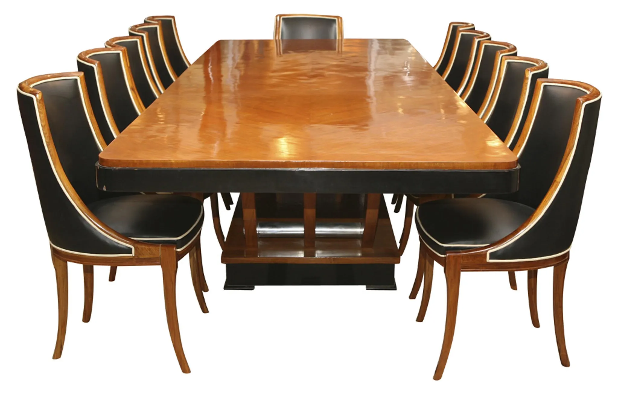 Table à manger ancienne pour 12 personnes dans un cadre élégant.