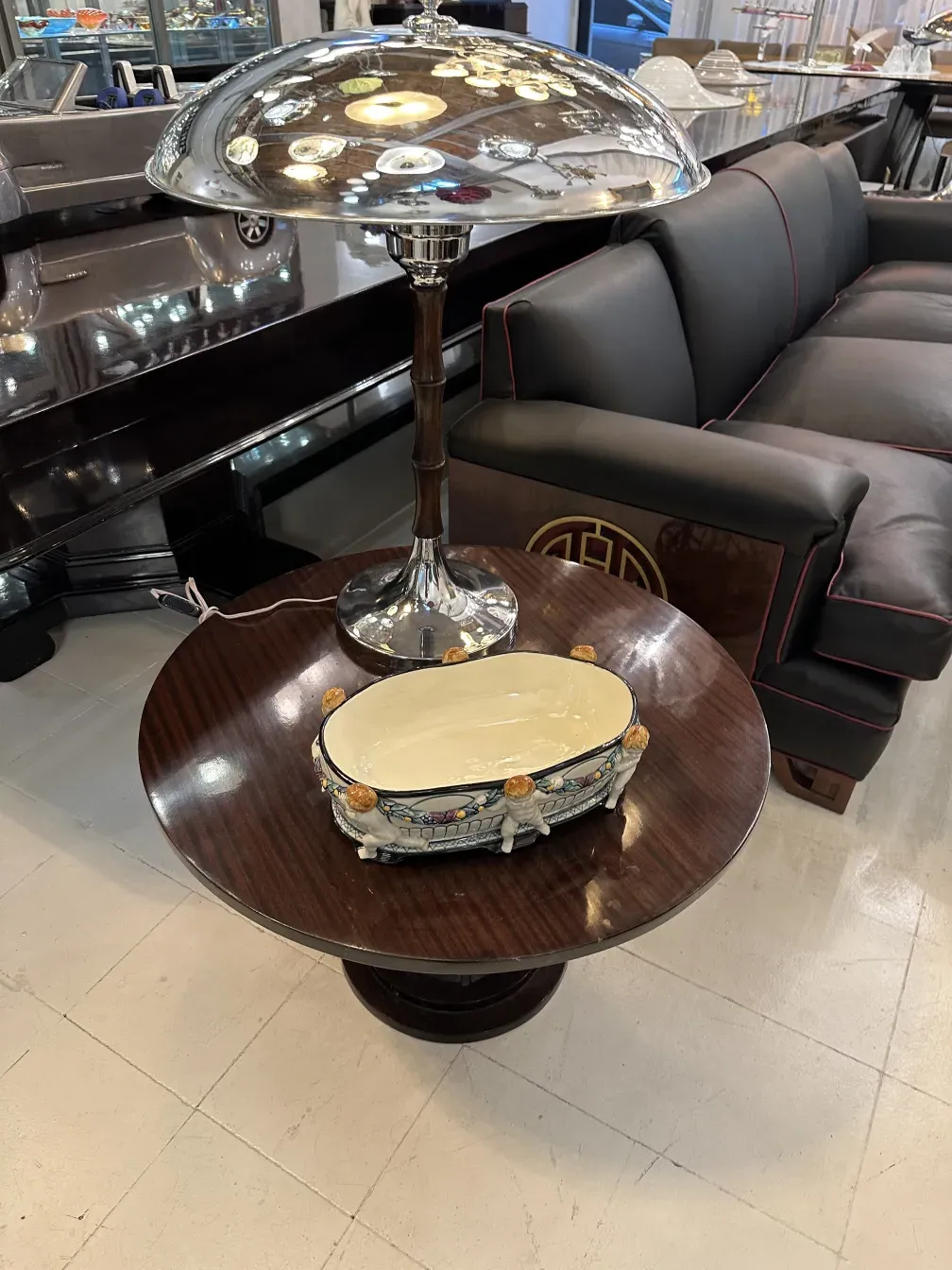 An elegant antique ceramic piece with colorful details in a modern setting.