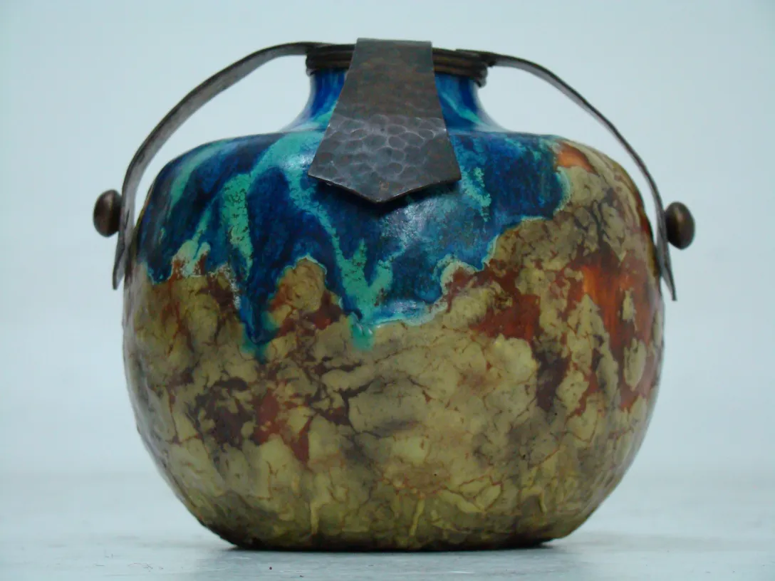 antique ceramic with blue, brown, and green, decorative wrap