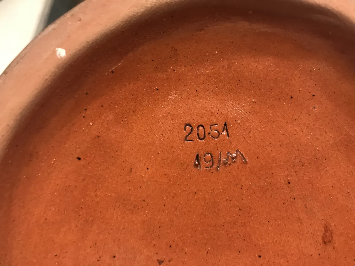 Interior de una cerámica antigua con textura terracota