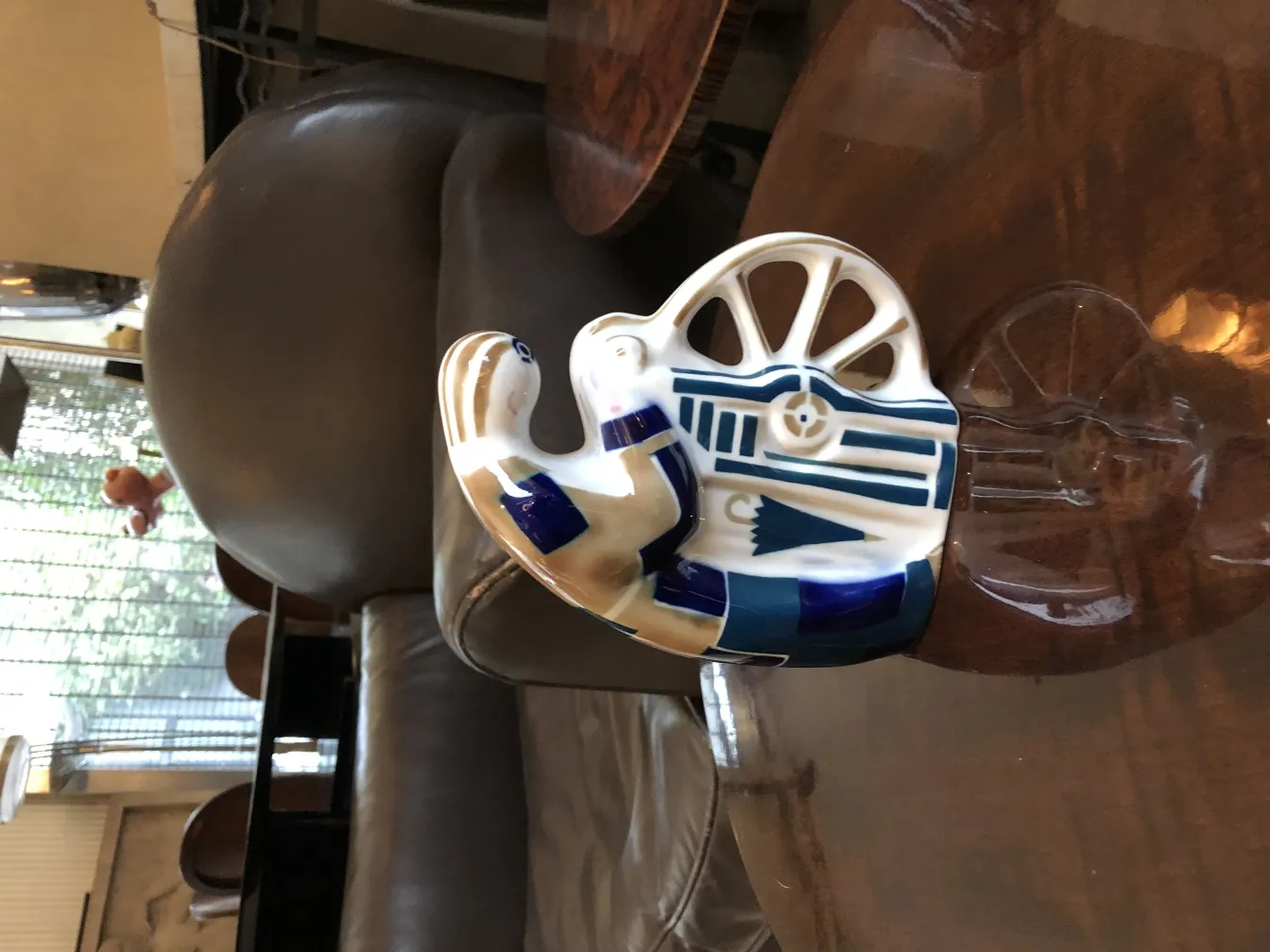 Decorative antique ceramic with artisan design, blue and white colors