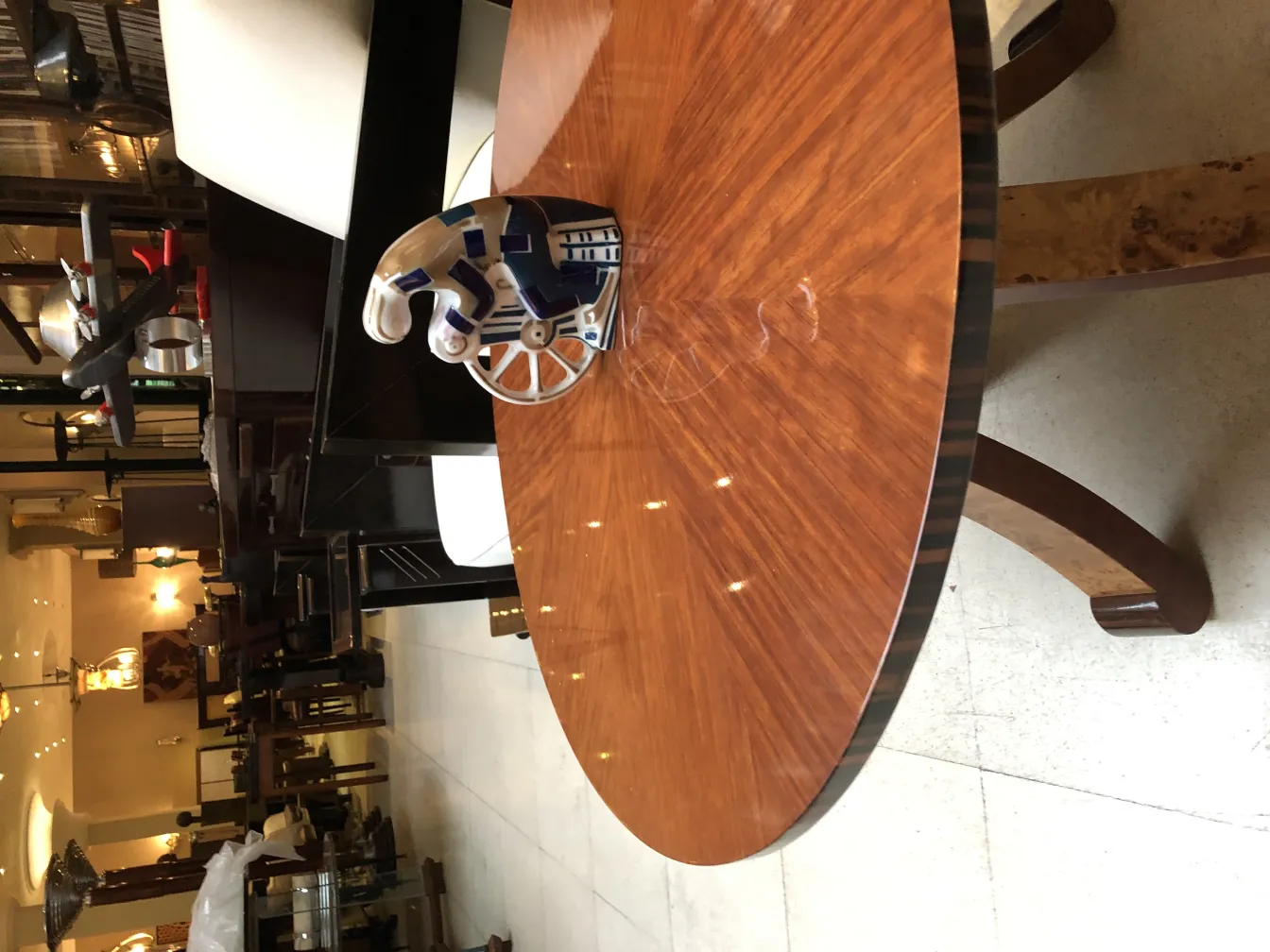 antique ceramic with light colors and decorative details, on an elegant table