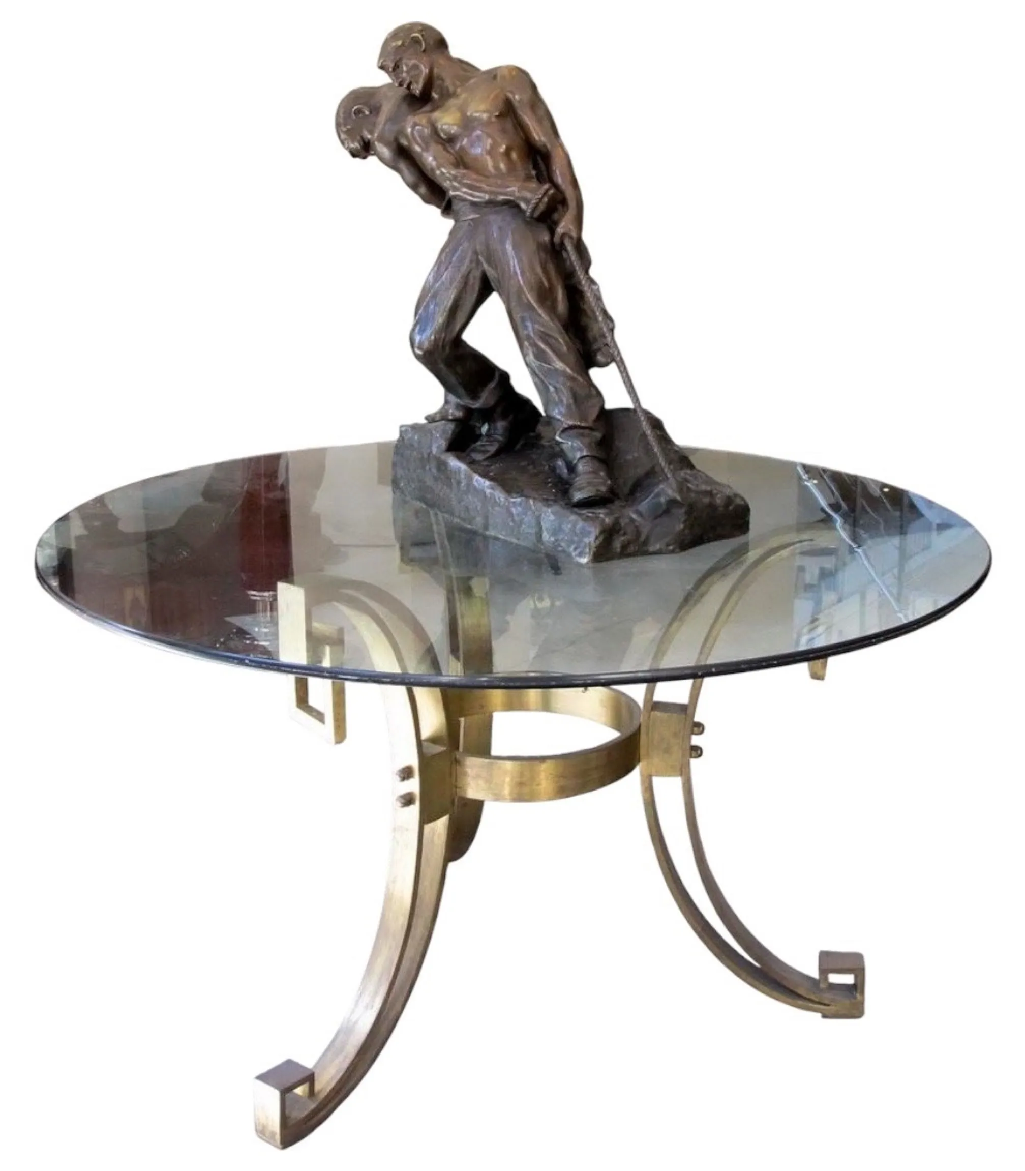 Mesa de comedor antigua con base decorativa y figura