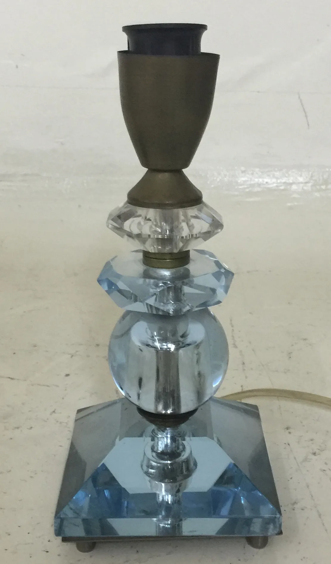 Antique table lamp with blue glass base and metal details