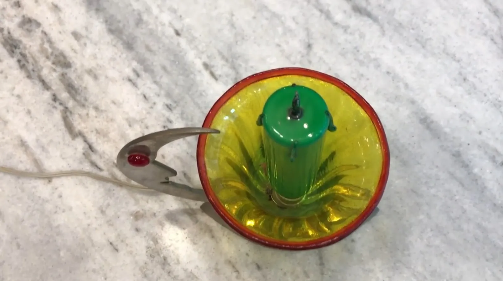 Antique table lamp with colorful base and eye-catching design