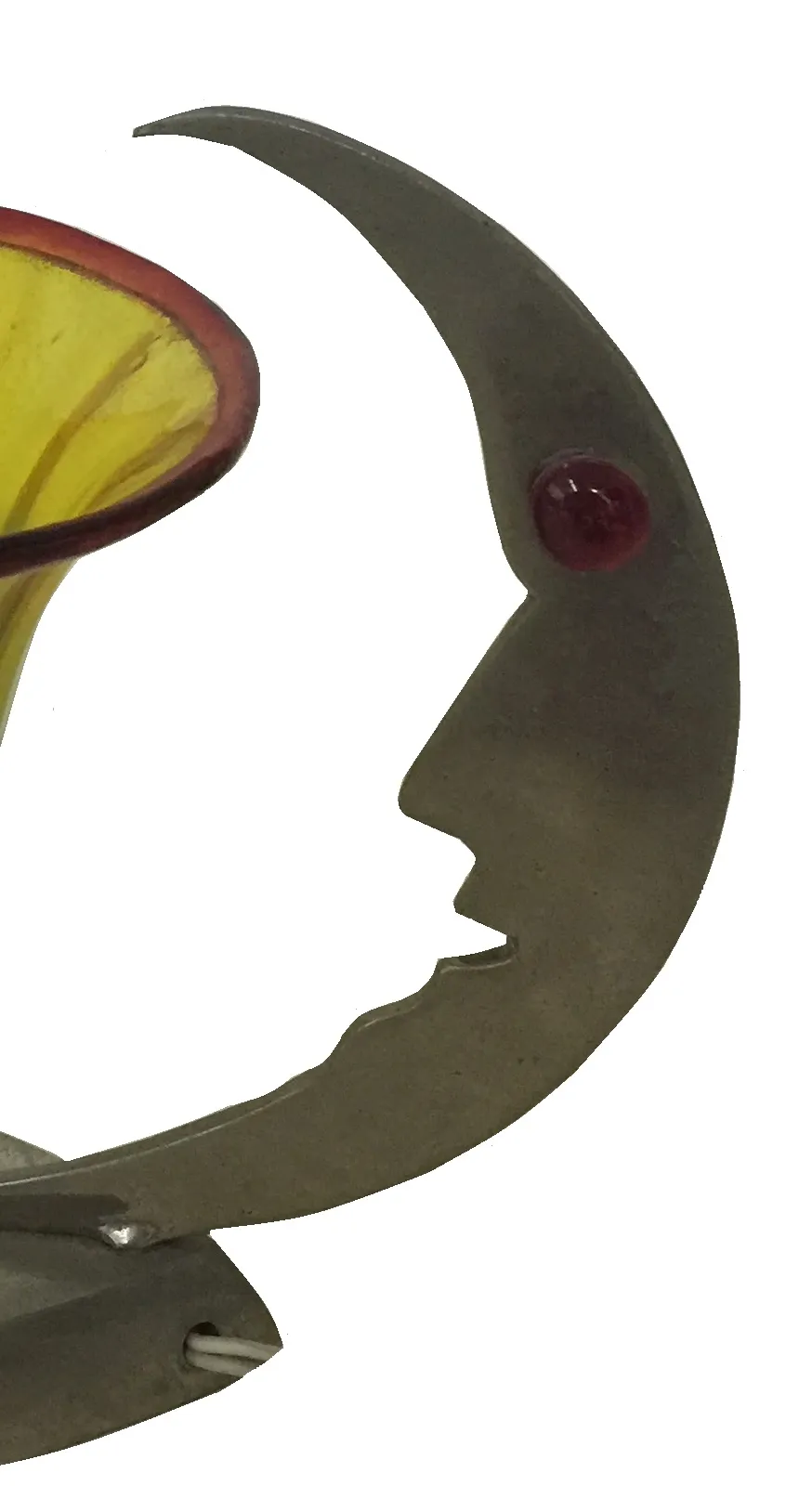 antique table lamp featuring a moon design and a face. Yellow color with red accents.