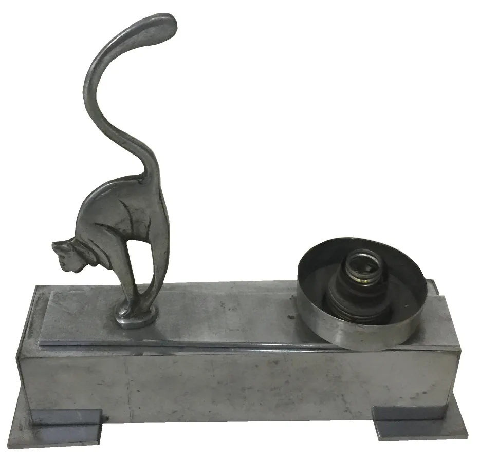 antique table lamp featuring a metallic cat design