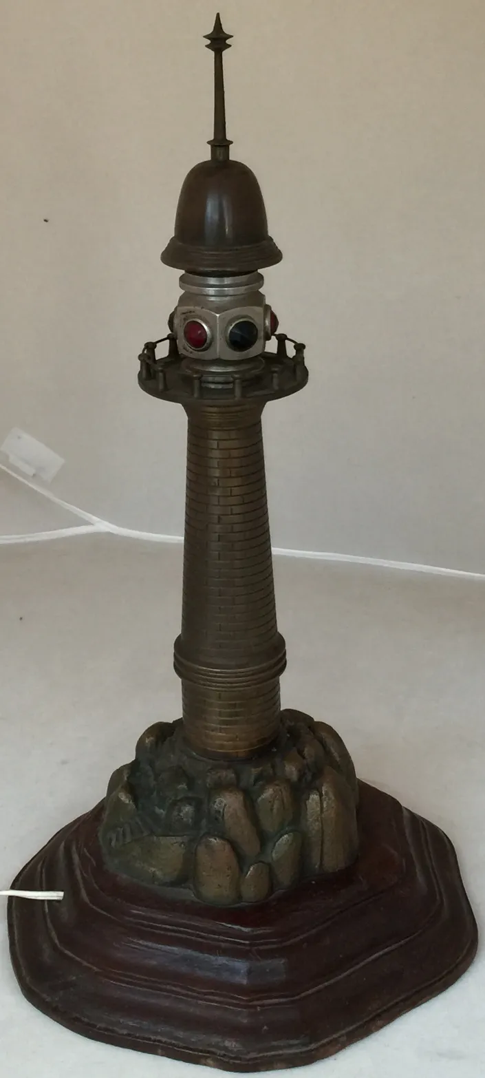 table lamp with rock base and antique lighthouse design