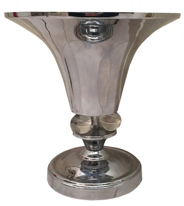 Lampada da tavolo antica luminosa con base rotonda e design moderno.