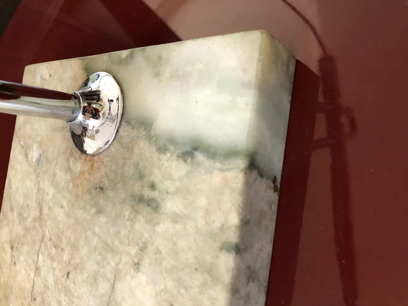 antique table lamp with a decorative base in subtle colors