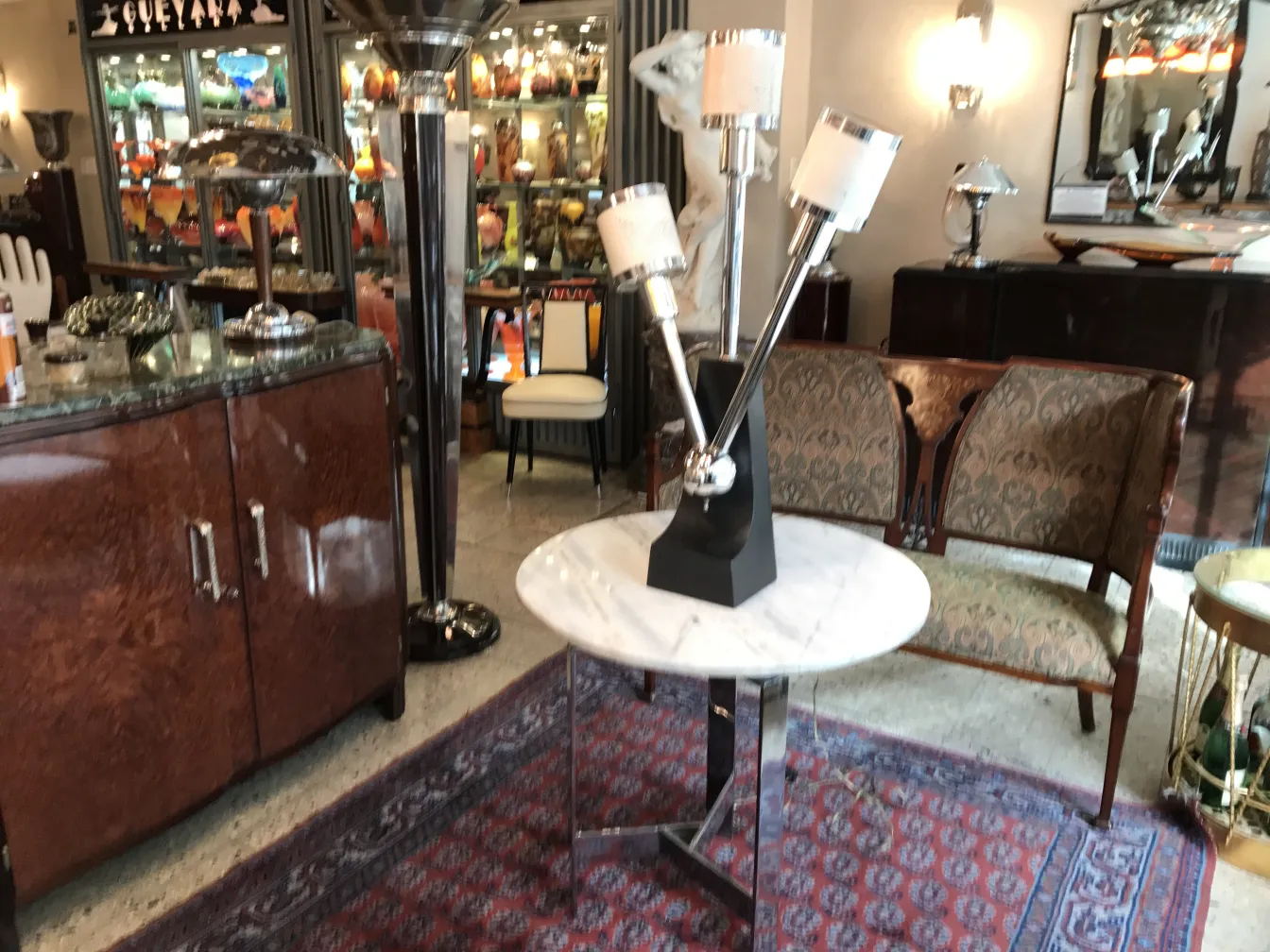 antique table lamp illuminated in a decorated room