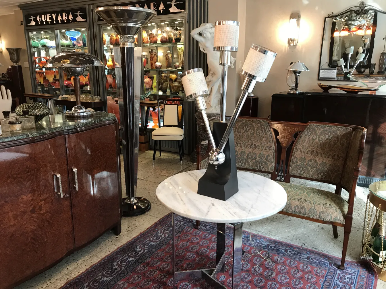 Antique table lamp with multiple lights in an elegant setting