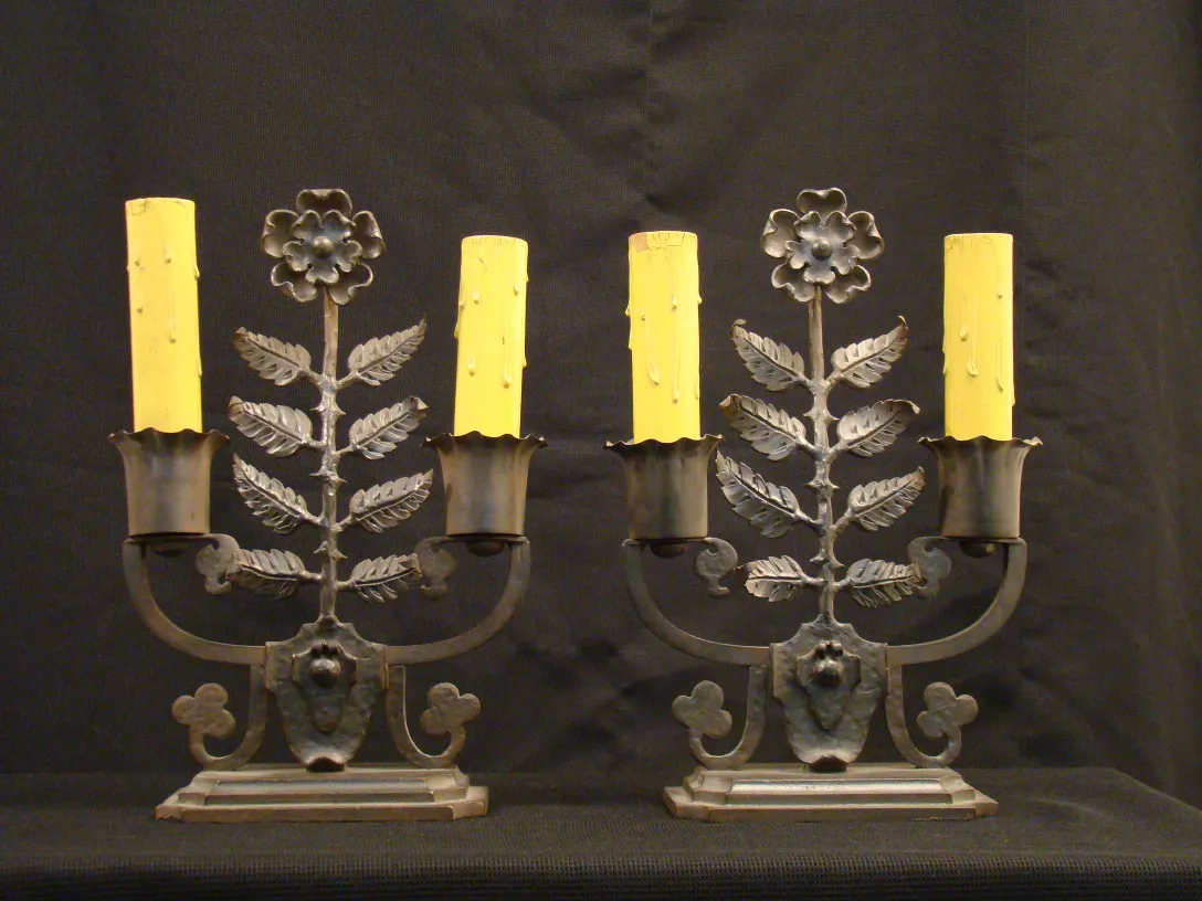 Antique table lamp with yellow candles and floral design