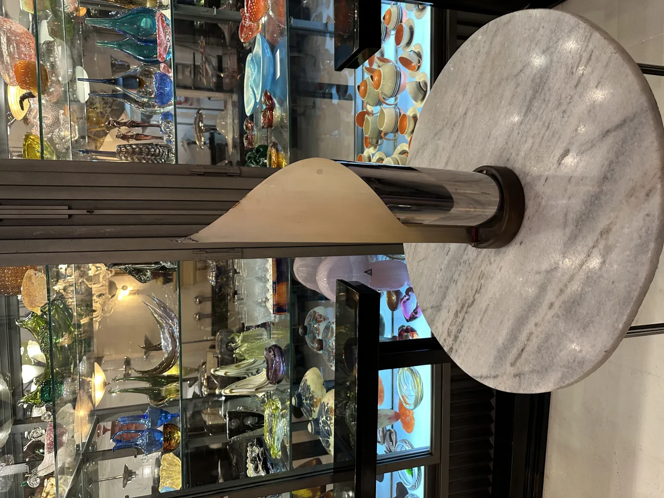 antique table lamp with decorative base, in a classic setting