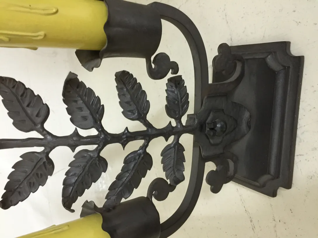 Antique table lamp with a leaf-themed base