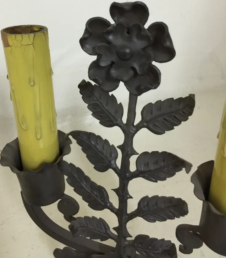 Antique table lamp featuring rose design in dark finish.