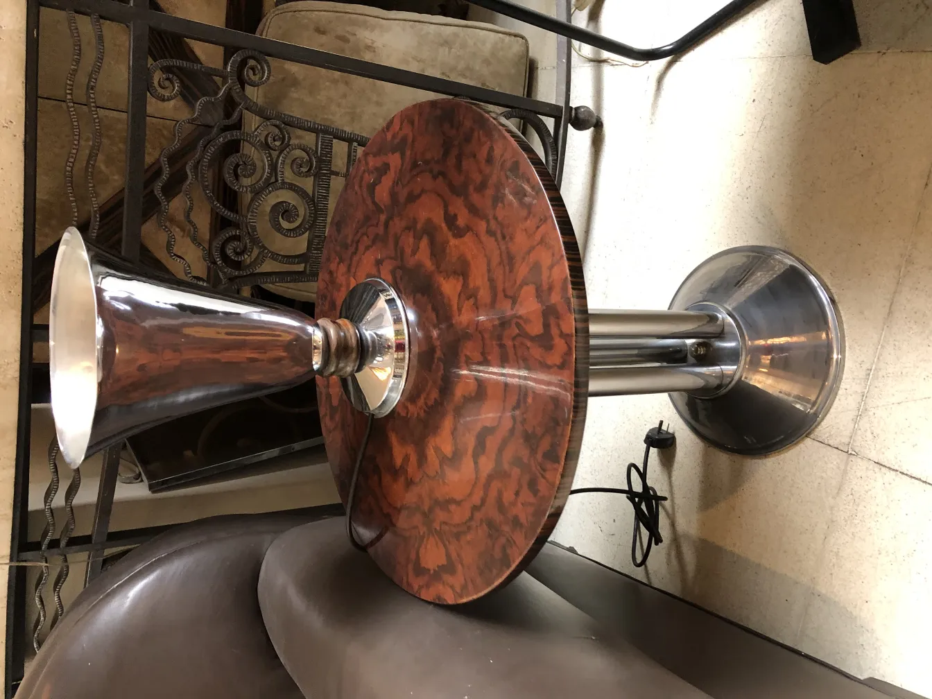 antique table lamp with shiny base in a cozy setting