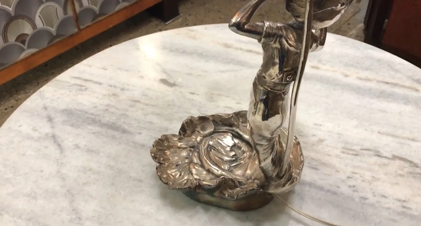 antique table lamp with figure, soft light, cozy background