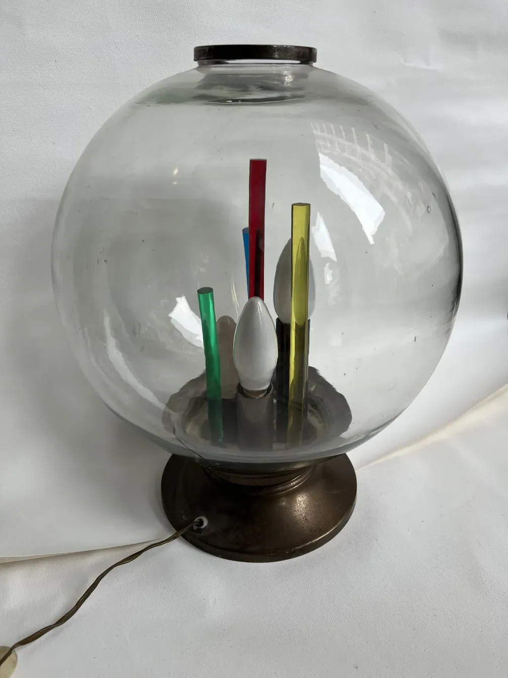 antique table lamp featuring colorful design and round base