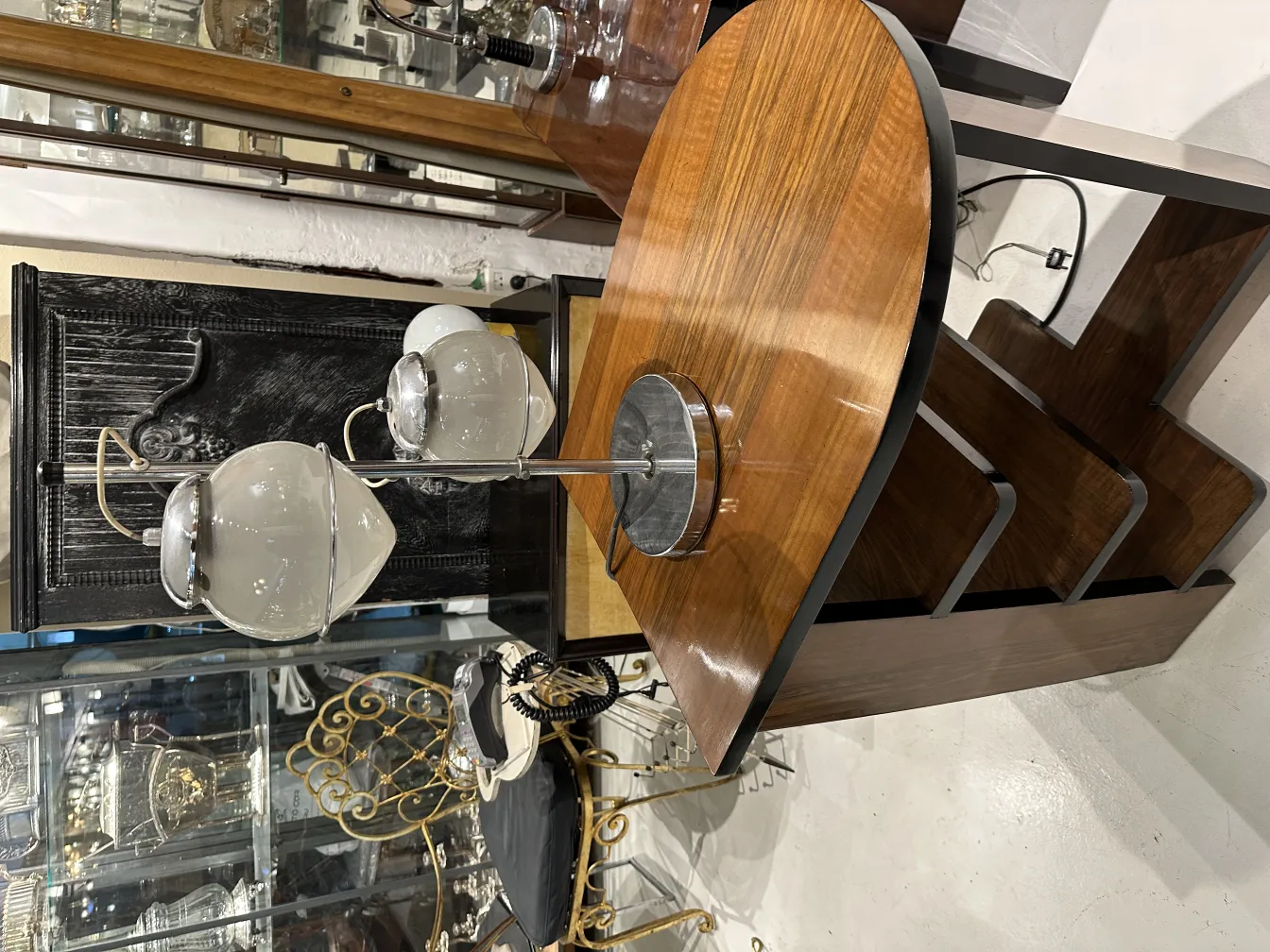 antique table lamp featuring a metal base and two shades