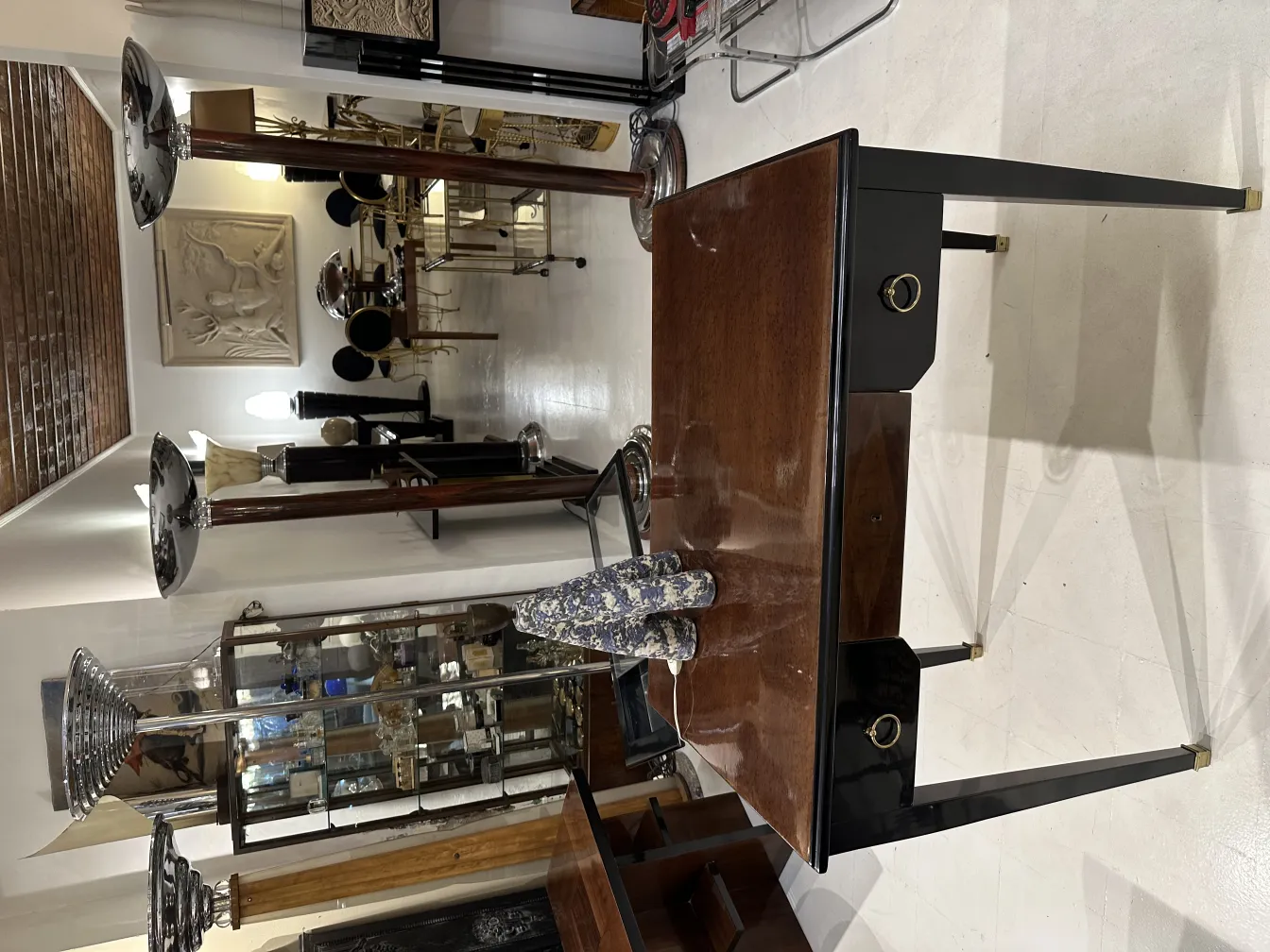 antique table lamp with an elegant base and decorative details, set in a vintage environment