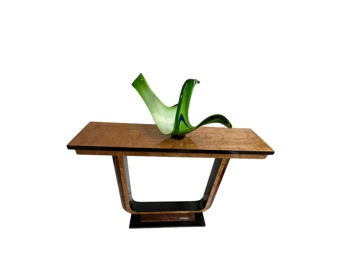 antique console with decorative green ornament