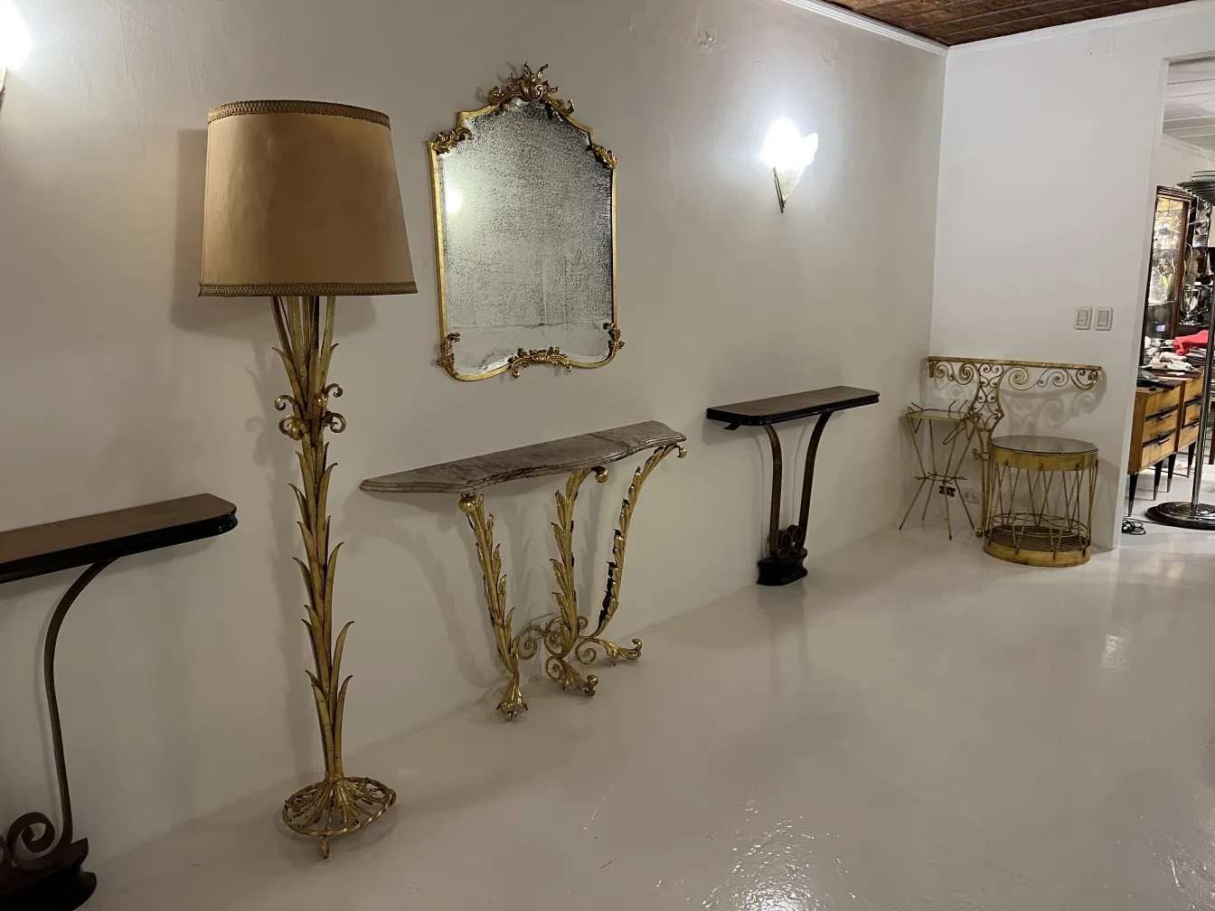 antique decorative console with mirror and floor lamp