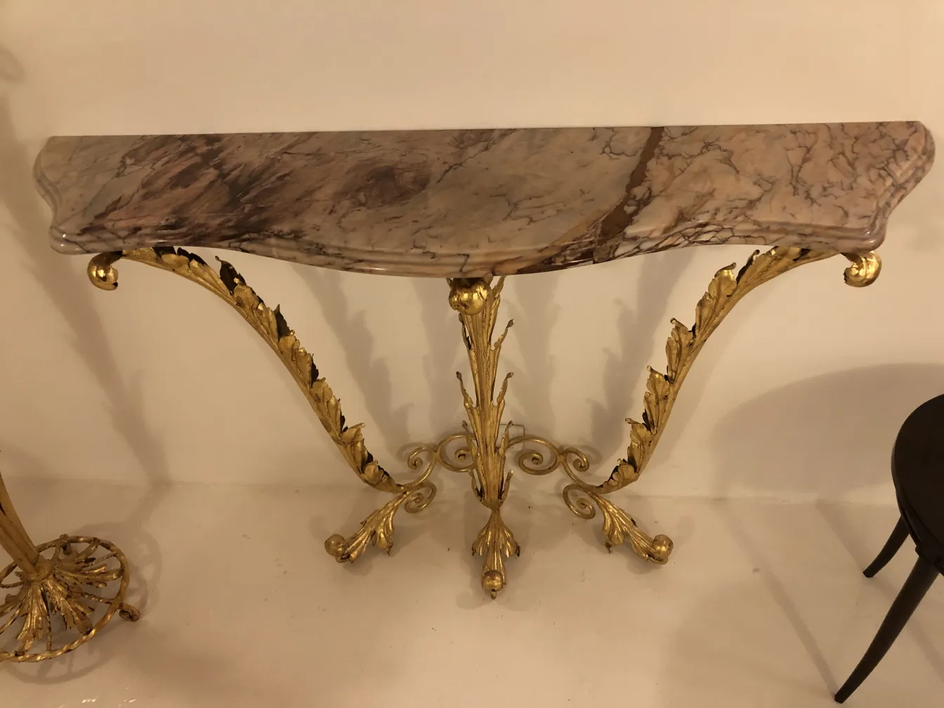 antique decorative console with gold details and marble