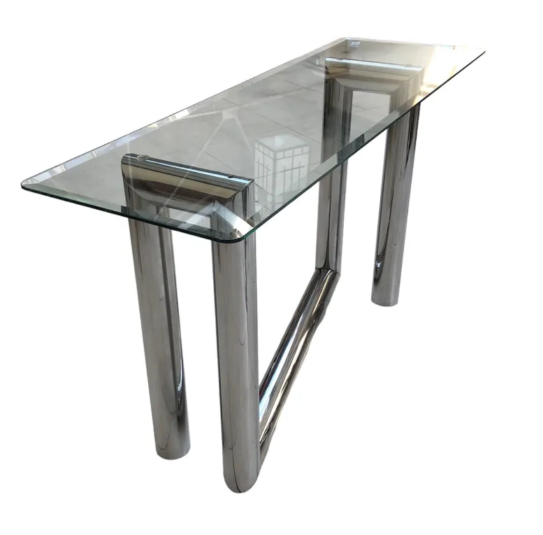 antique glass console with shiny round legs