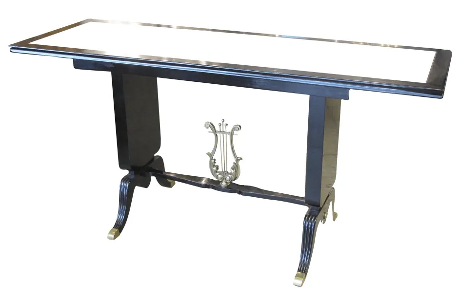 Antique console with elegant design and curved legs.