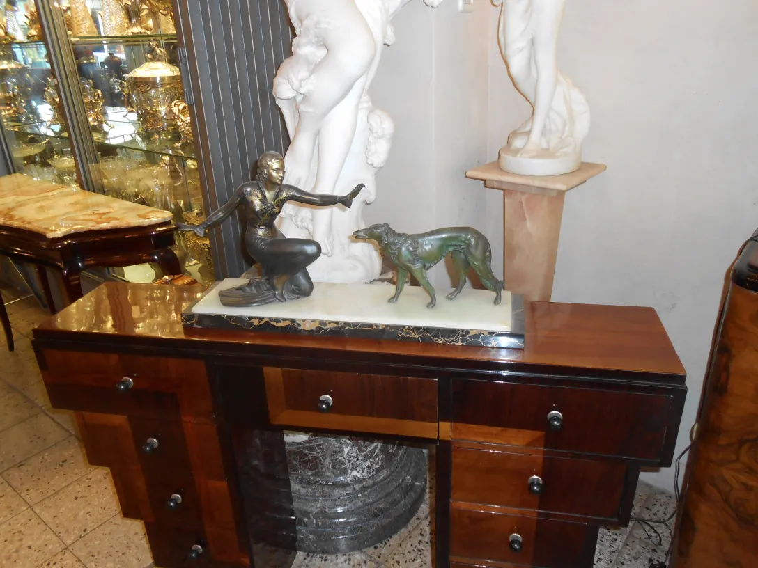 Antique console with decorative features and sculptures