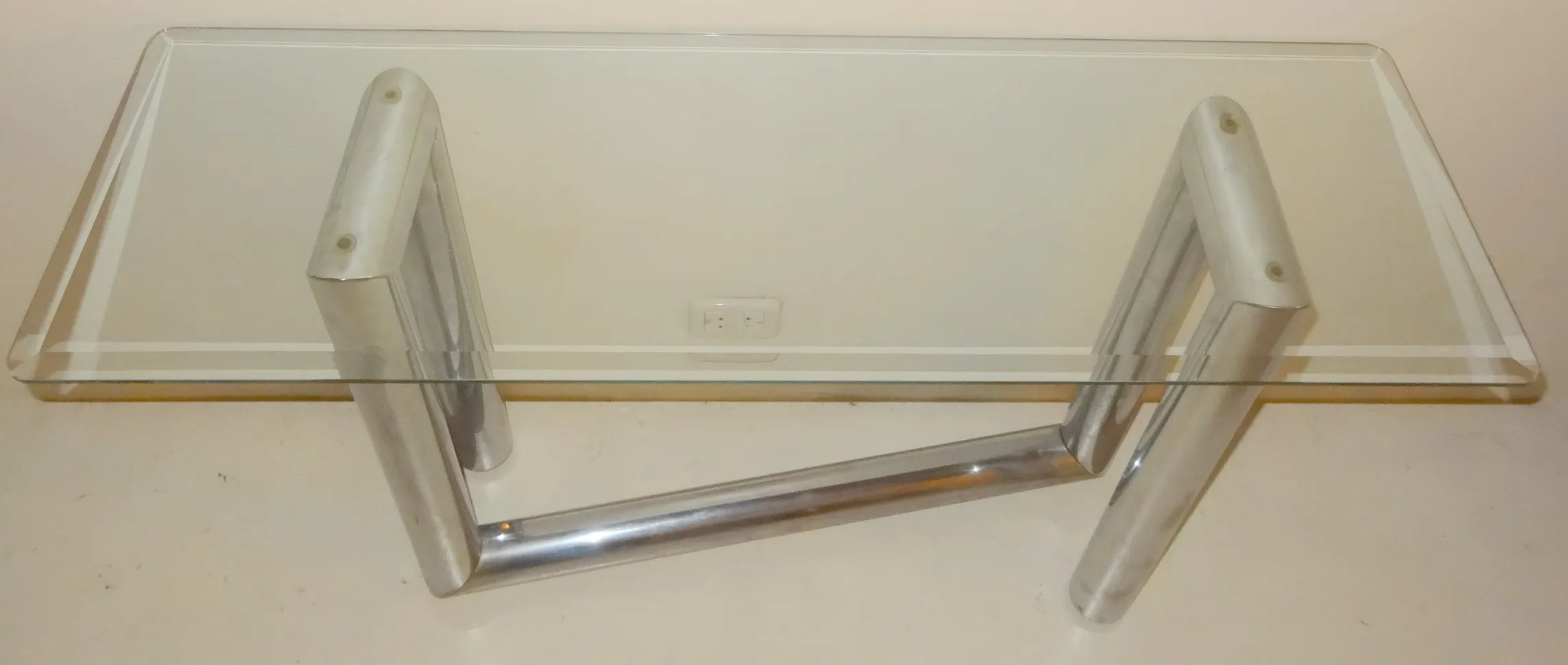 Antique decorative console with distinctive design on neutral background