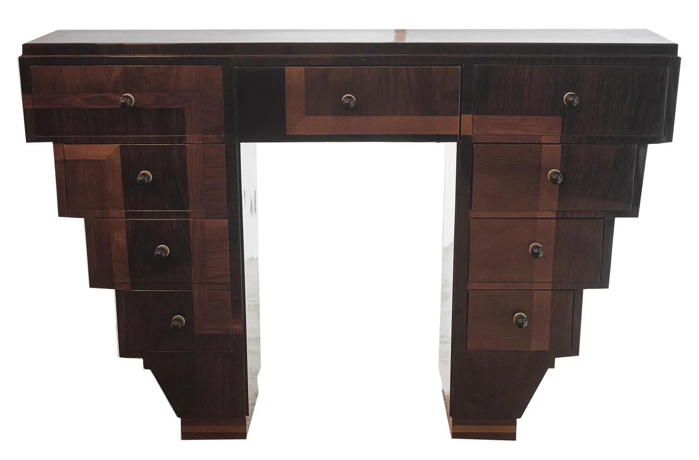 antique console featuring intricate design and drawers