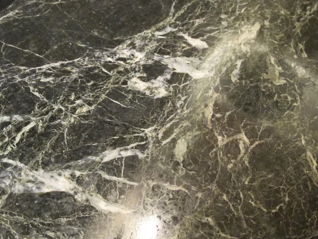 surface of an antique console with light veins