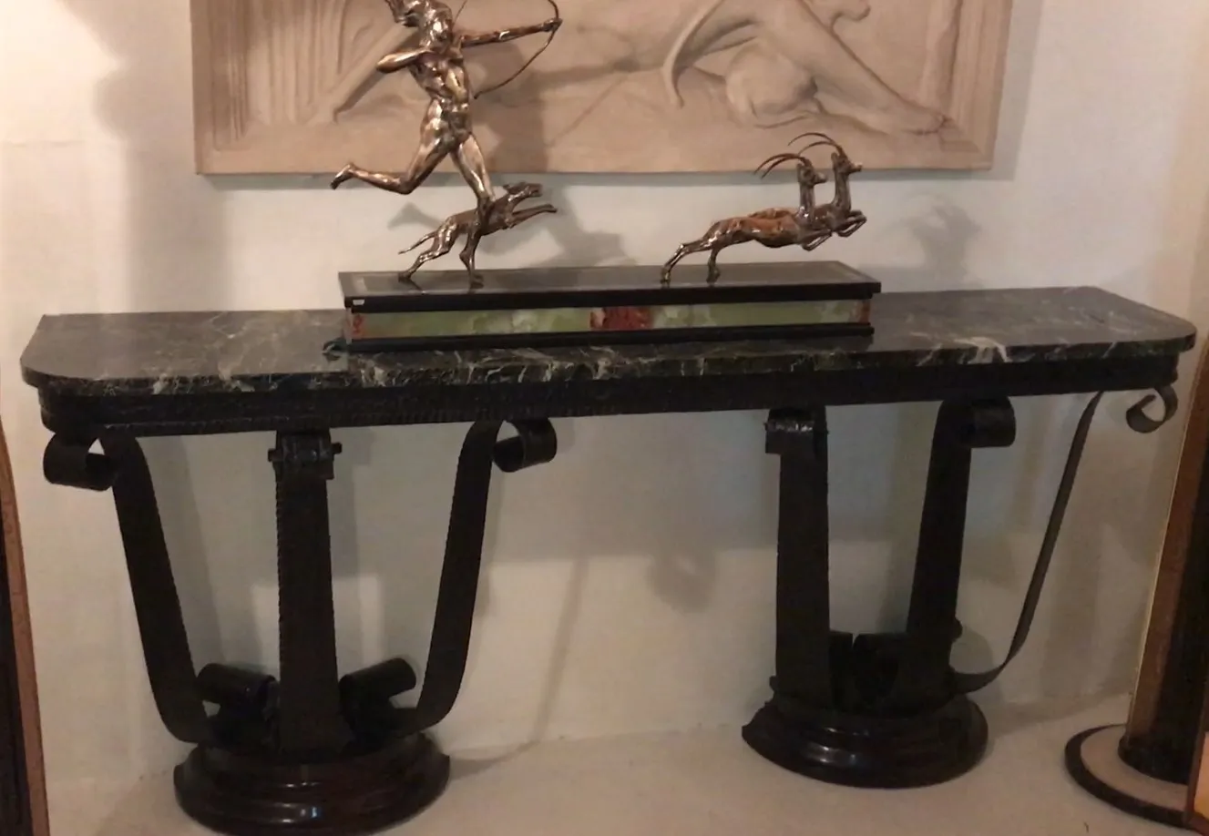 antique elegant console with decorative sculptures