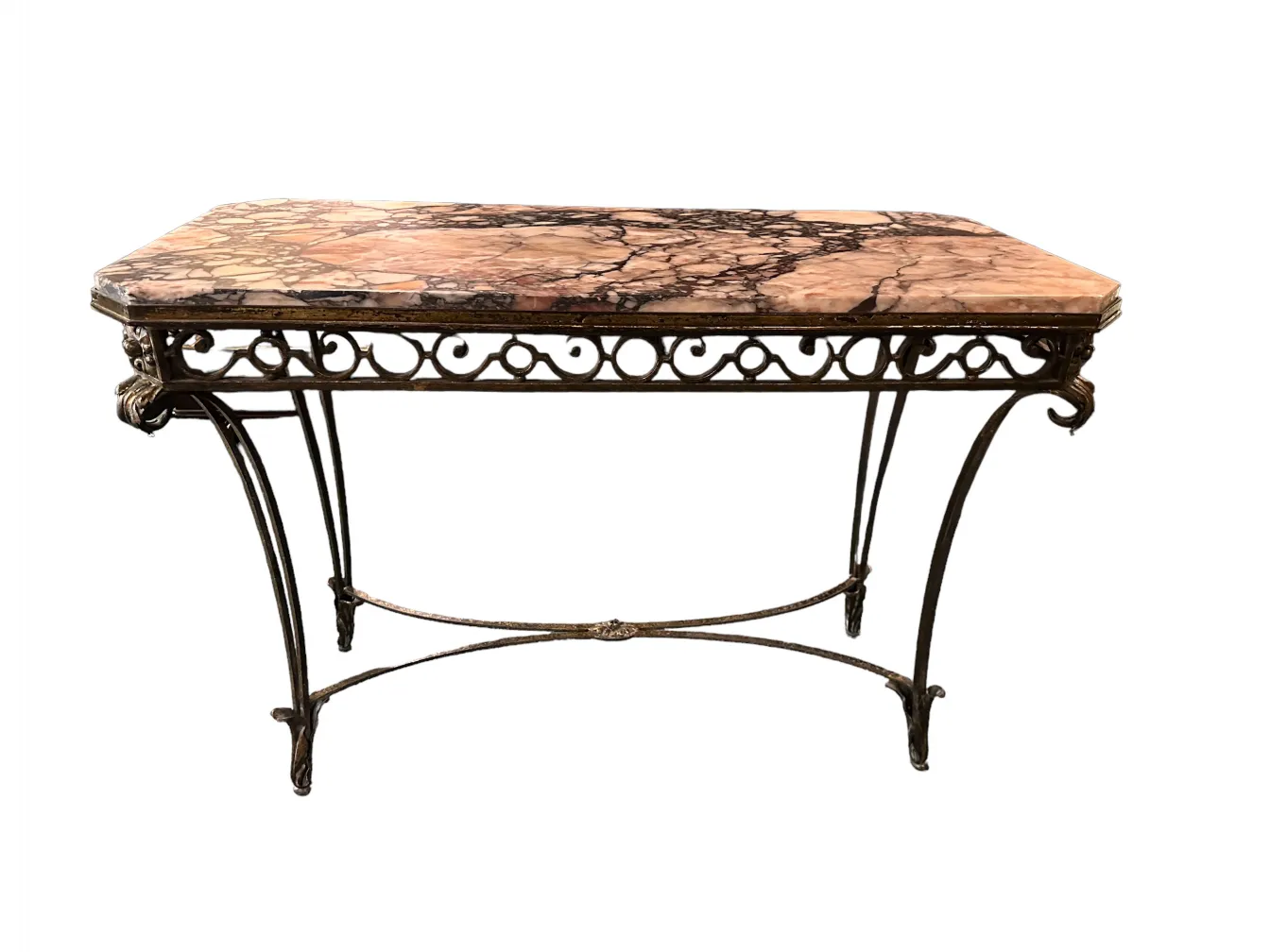 antique console with decorative surface and elegant legs