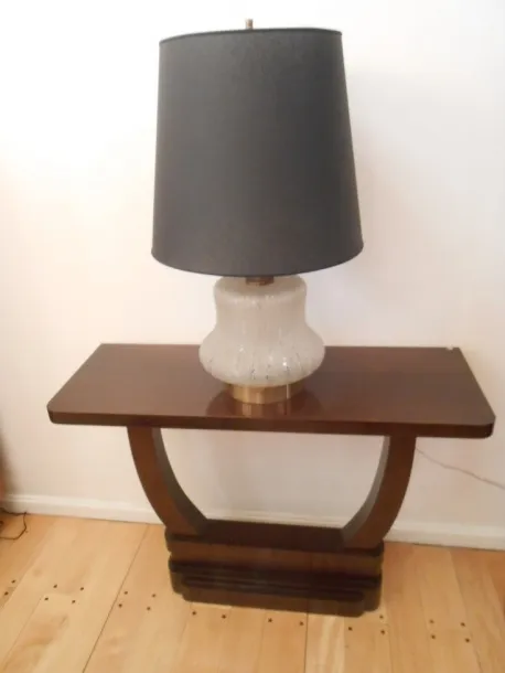 antique decorative console with modern lamp