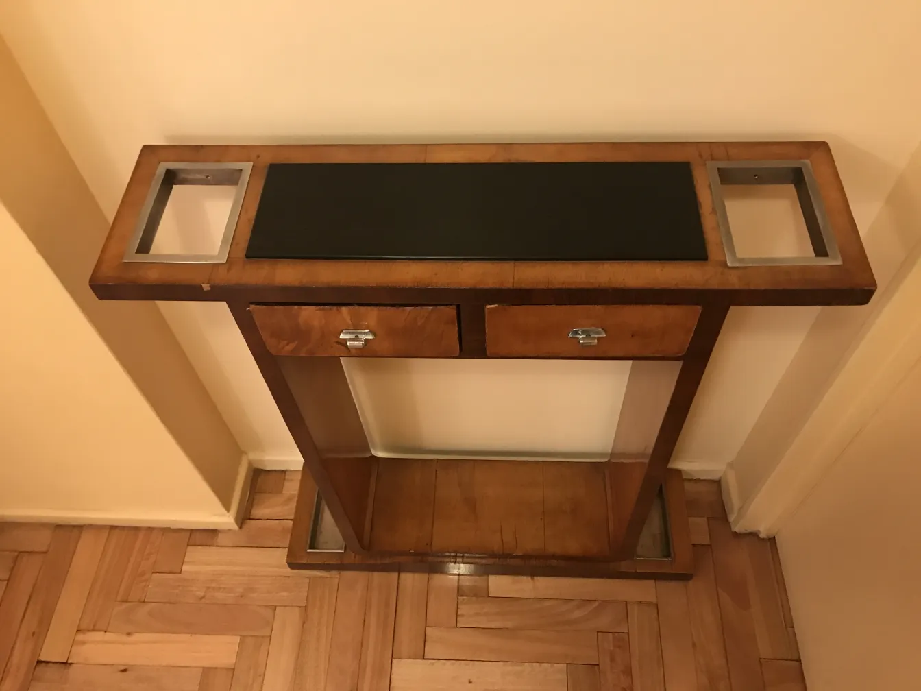 table console ancienne avec deux tiroirs et surface noire