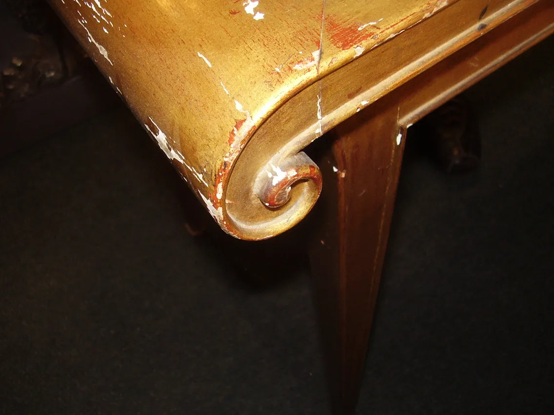 detail of an antique decorative console with design