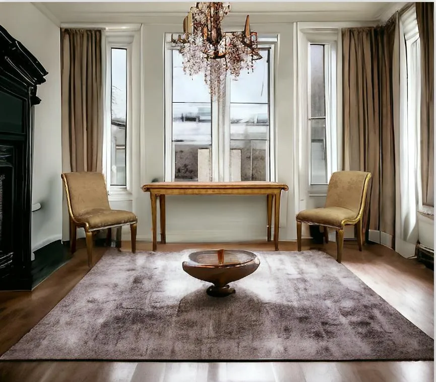 antique console with two chairs in a bright setting