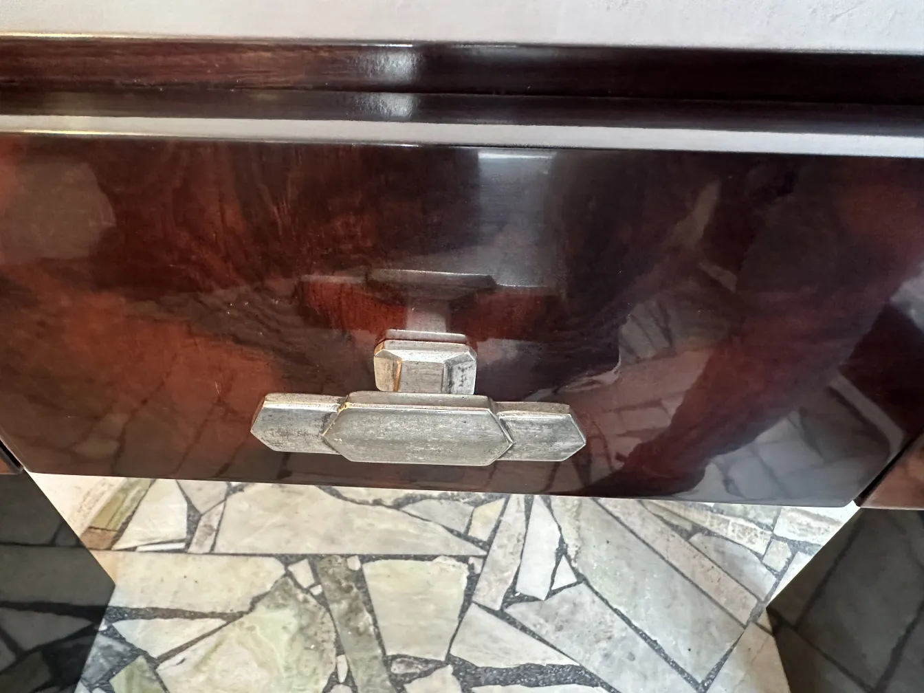 antique consoles with detailed lock and shiny surface