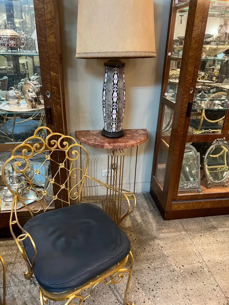 Antique consoles with elegant design and decorative details in a classic setting.