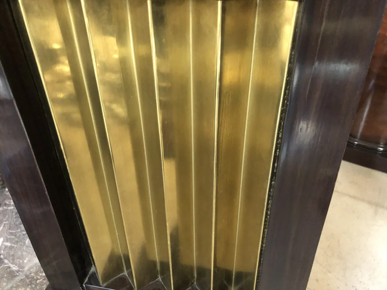 View of two antique consoles with gold details