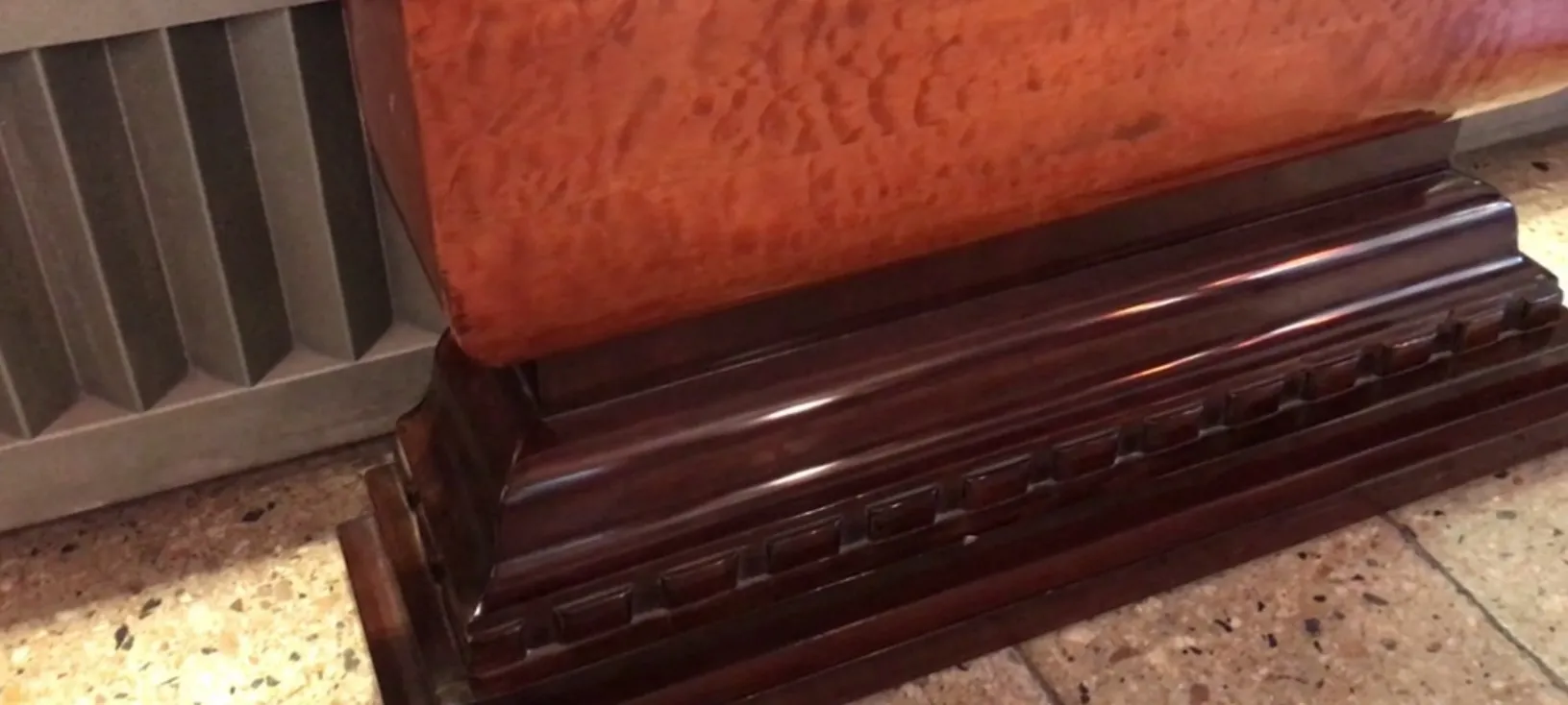 view of two antique consoles with decorative details