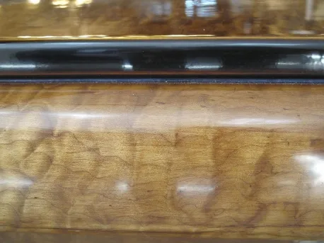 details of antique consoles with a shiny finish, warm ambiance