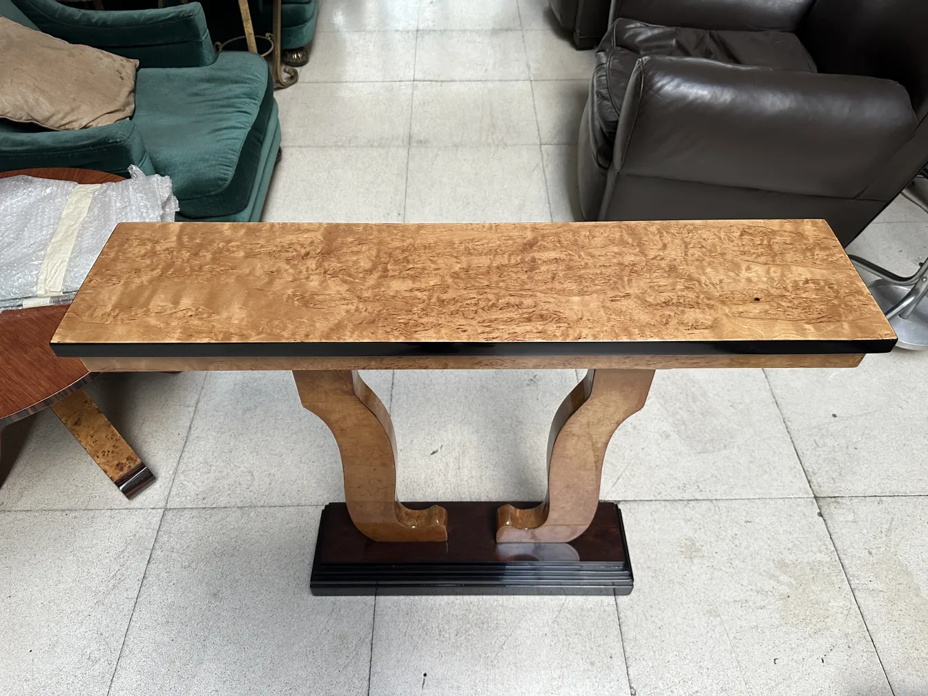 Two antique consoles with elegant design in a cozy setting